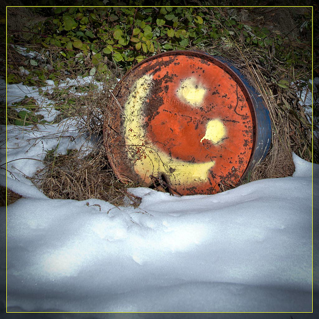 Smiley Face on Oil Drum