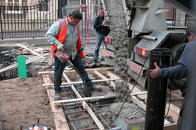 Pouring new concrete in front of the Mauritshuis in The Hague
