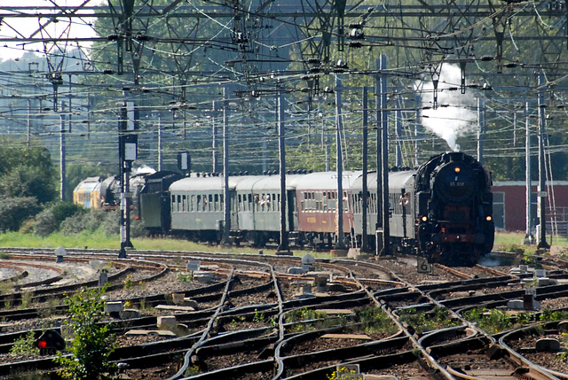 Celebration of the centenary of Haarlem Railway Station: Steam train arriving at Haarlem