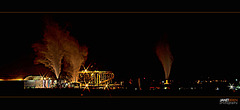Factory with Steam and Sparkling Lights