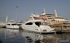 The new Sunseeker and accompanying vessel in front of the Royal Yacht