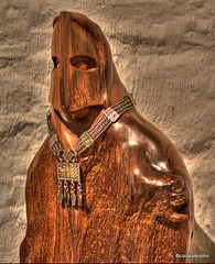 Gold and silver Bedouin Jewellery on a sculpture carved from beach driftwood