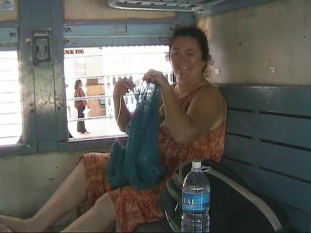 Sandy knitting on the train