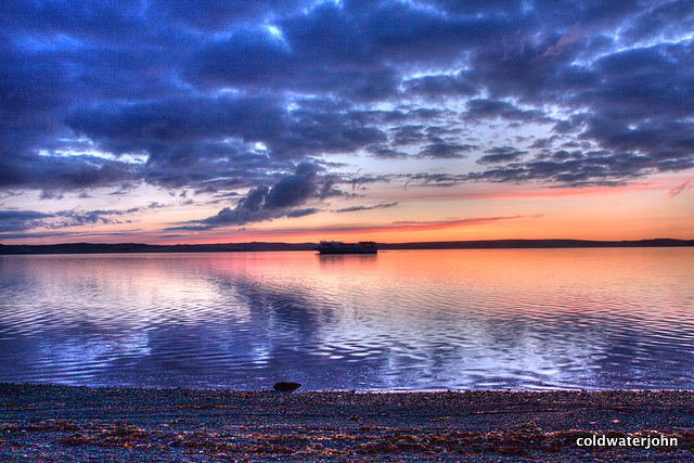 The evening ferry approaching Stranraer down Loch Ryan