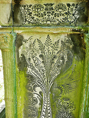 brompton cemetery, london,mastic patterns let into the back of an unreadable late c19 gravestone