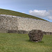 The controversial quartz and ovoid boulder reconstructed facade at Newgrange