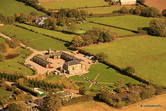 Aerial - Bentley's farmhouse (?), from 1029 feet above Whitley Village Hall, looking east