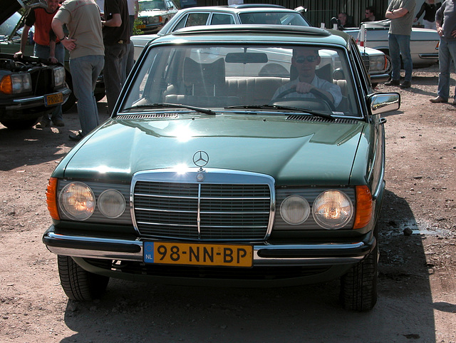 Mercedes-Benz 250 with its lights on