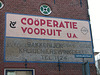 Faded and restored wall ad on a former bakery