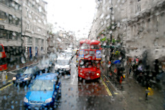 Busy Piccadilly in the rain
