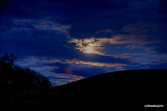 Moonlight in cloudy skies