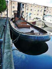 tugs in docklands, london