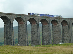 A train crossing Ribblehead Viaduct