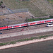 German train riding along the Rhine