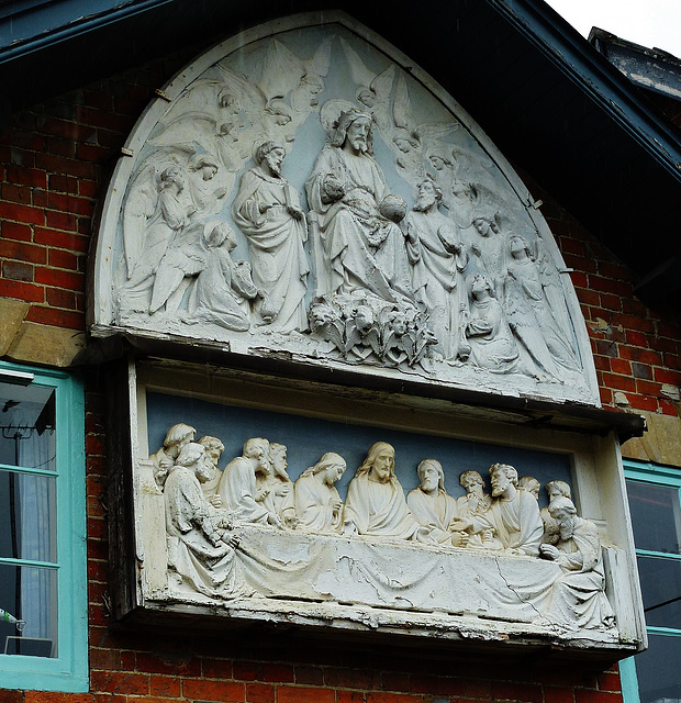great bedwyn masons' yard; last supper (reredos?) and doom (tympanum?). note the beasts of the apocalypse under christ's feet.  these are the last two big pieces left fixed to the side wall above the 