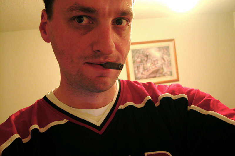 Me smoking my first cigar in a Canadian motel room Me smoking my first cigar in a Canadian motel room