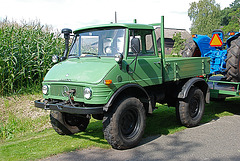 Unimog pulling a tractor