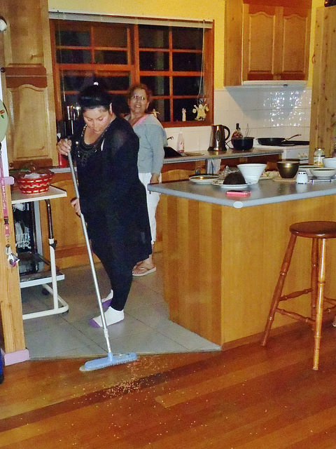 sweeping out the bad luck on New Year's Eve