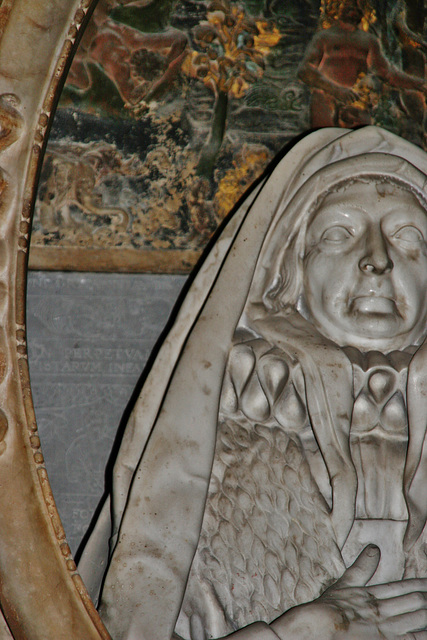 ightham church, kent,detail of the tomb of dorothy selby, 1641, by edward marshall. behind the effigy are representations of her needlework, with a stump work adam and eve above slate incised with her