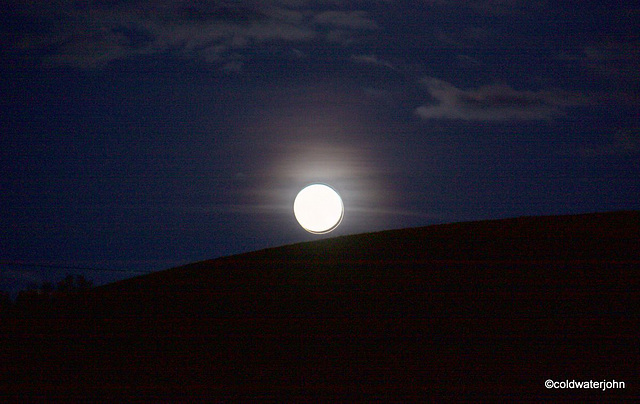 Nearly Full moon with cloudcover increasing...#1