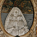 ightham church, kent,detail of the tomb of dorothy selby, 1641, by edward marshall. behind the effigy are representations of her needlework, with a stump work adam and eve above slate incised with her depiction of the dispersal of the armada, the revelati