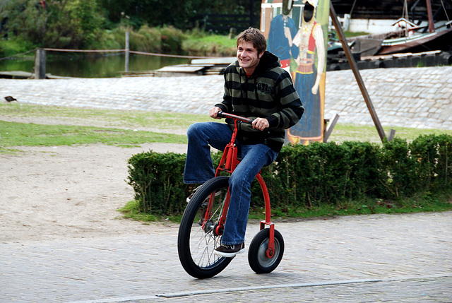 A visit to the Open Air Museum (Heritage Park): somebody succeeding to ride the velocipede