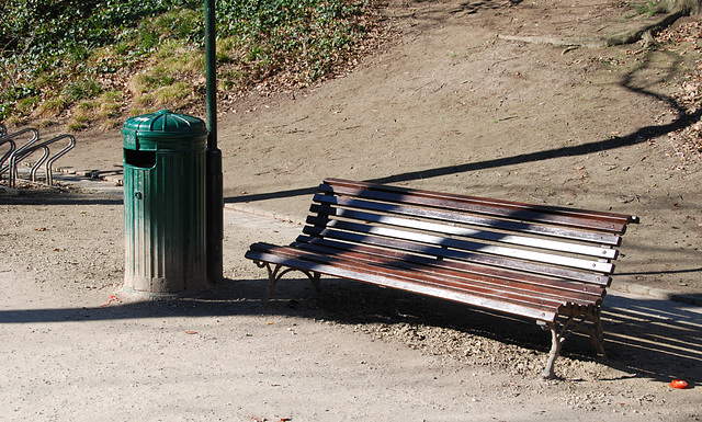 Bench in the city park in Leuven and a young dalek