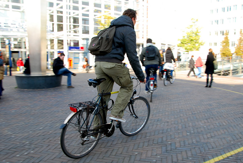 Biking in front of Leiden Centraal station