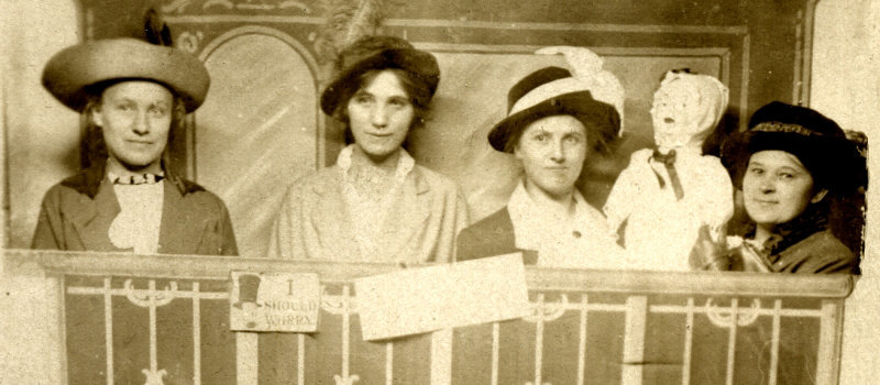 Four Women and a Doll on a Train (Detail)