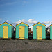 7 green beach huts