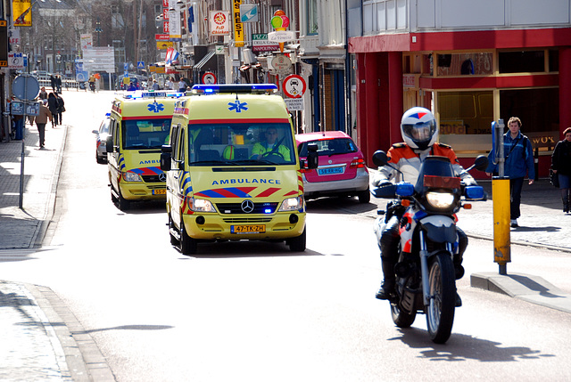 Two ambulances escorted by the police