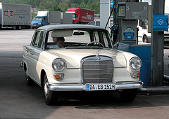 Holiday day one: Mercedes-Benz Heckflosse at a petrol station