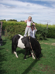 Chloe standing on Alfie