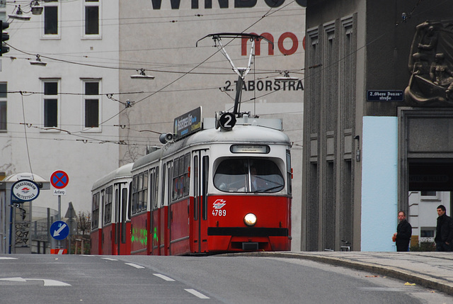 Old tram climbing the bridge