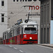 Old tram climbing the bridge