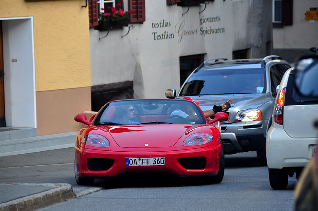 Holiday 2009 – Ferrari driver explains to a dim-witted driver how many cars fit in a narrow street