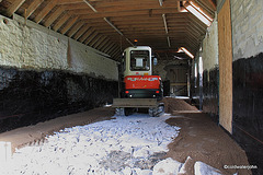 Bulldozer levelling the floor foundations - slow progress!