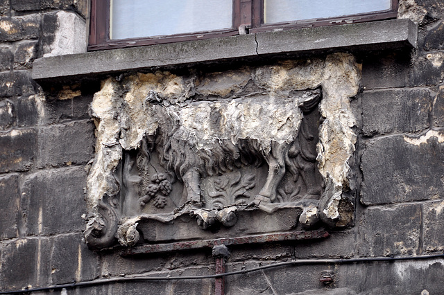 Damaged gable stone in Antwerp