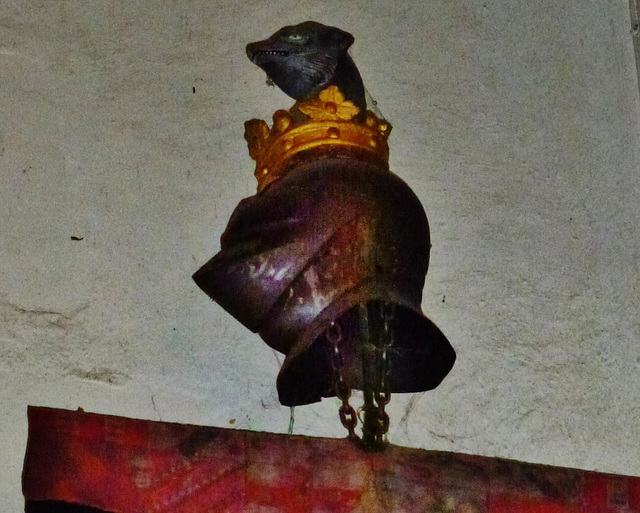 stoke d'abernon church , surrey,tabard, helmet and crest  of sir john norbury , who died in 1521. the tabard is a replacement