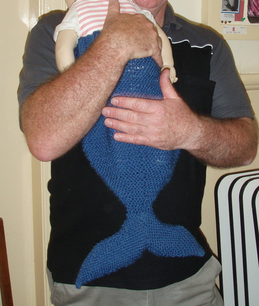 blue fish beanie as baby warmer