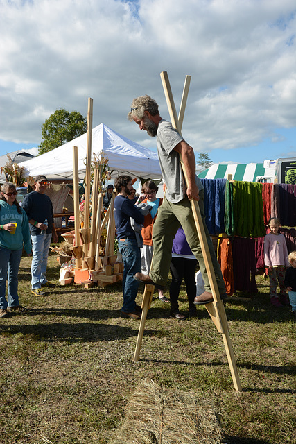 Adult on stilts