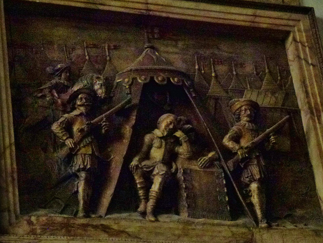 barking church, essex,monument by maximilian colt, 1625, for sir charles montague, showing him seated in a tent guarded by soldiers as if on the eve of battle