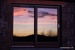 Dusk on a February Evening reflected in the west windows