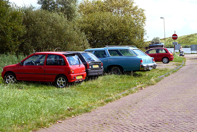 Small cars and a big car