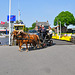 Horse-drawn carriage drives off the ferry