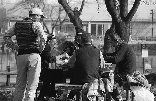 Locals play mahjong under the sky