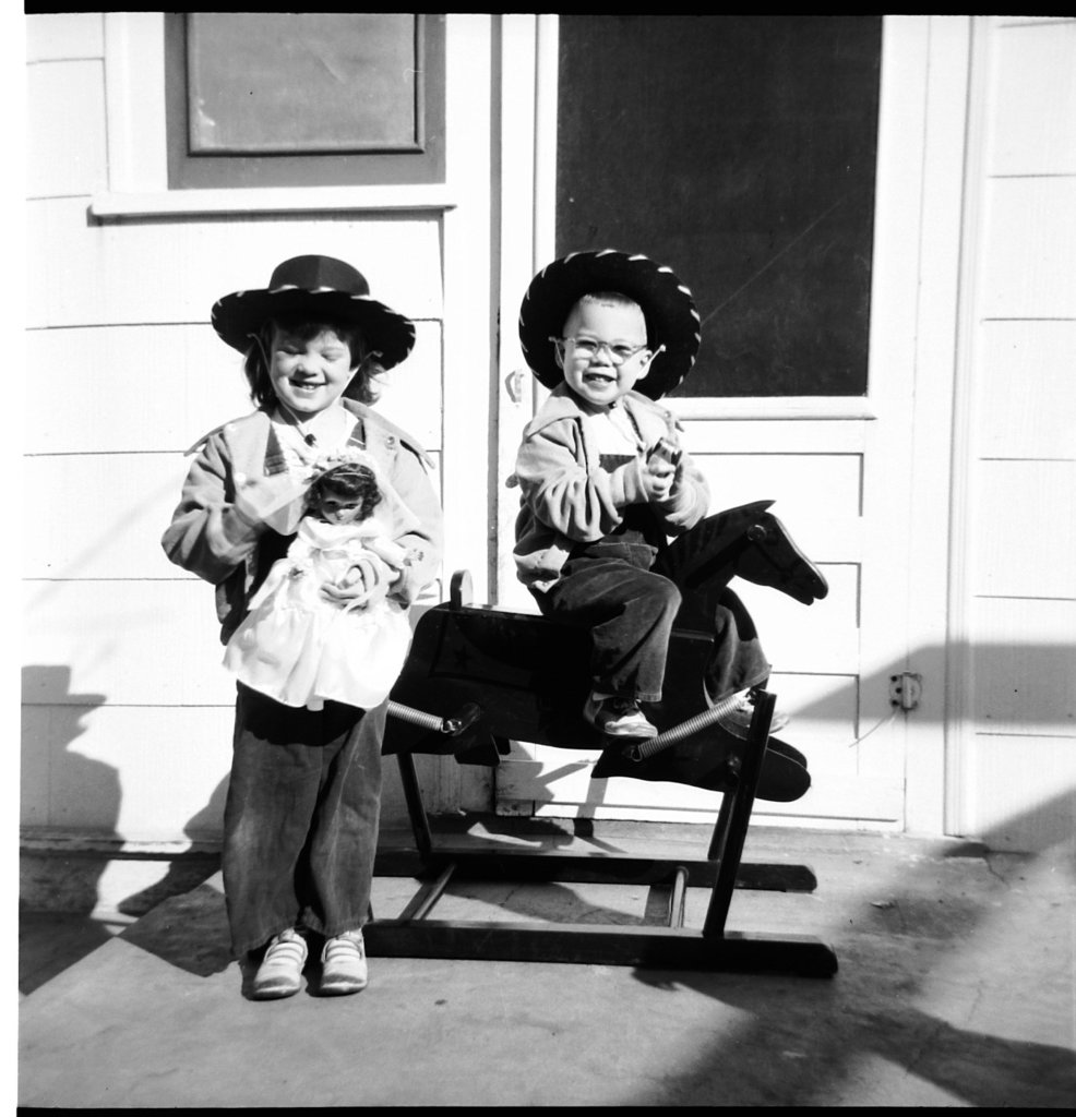 Frontier couple poses for itinerant photographer, 1951