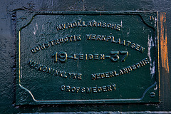 Plate on a bridge of the Koninklijke Nederlandsche Grofsmederij and the N.V. Hollandsche Constructie Werkplaatsen