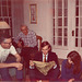 Having some fun with the new guy. "Gee, thanks, it's the lovliest one I've ever seen.  What is it?"  Horton, Grandpa Parkes, Rick and Mary. Christmas 1969