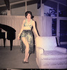 Hula mama, ready for the neighborhood costume party, about 1964